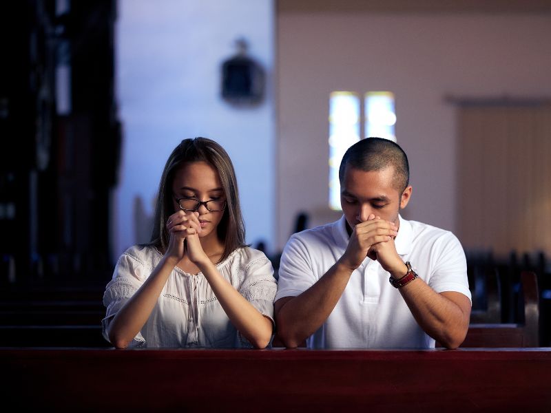 A couple praying together