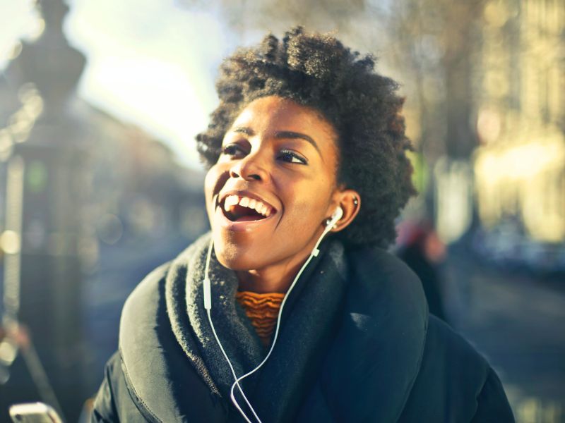 A lady listening to music