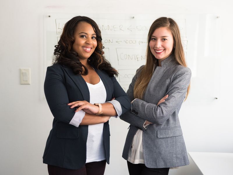 2 ladies in a corporate wear ready for an interview