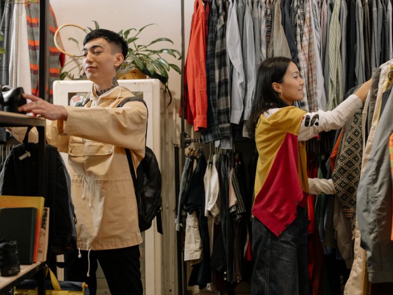 People thrift shopping
